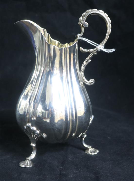 An early Victorian silver cream jug by John Wilmin Figg, London, 1841, height 16cm.